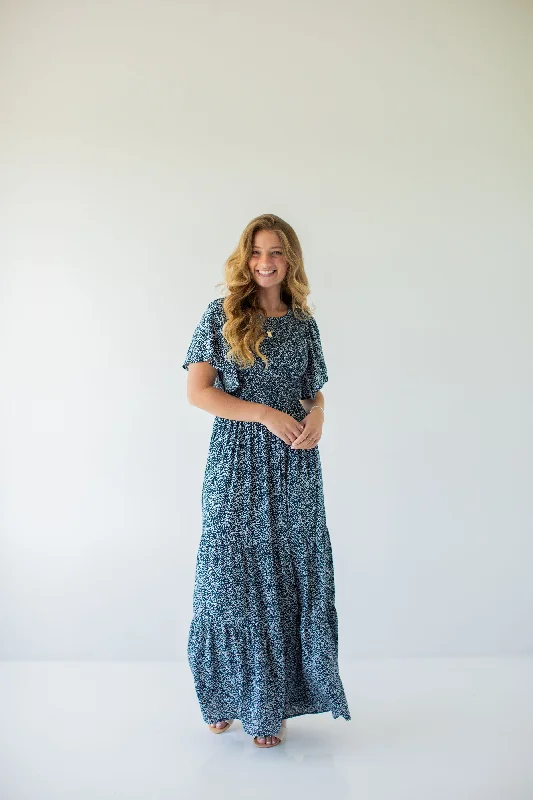 'Faith' Smocked Bodice Flutter Sleeve Floral Maxi Dress in Navy